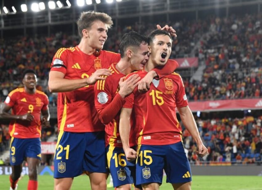 Bryan Zaragoza (R) celebrates scoring his team's third goal in the win over Switzerland