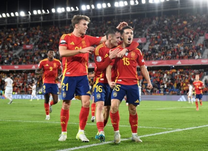 Spain finished unbeaten and top of Group A4 after winning five of six matches