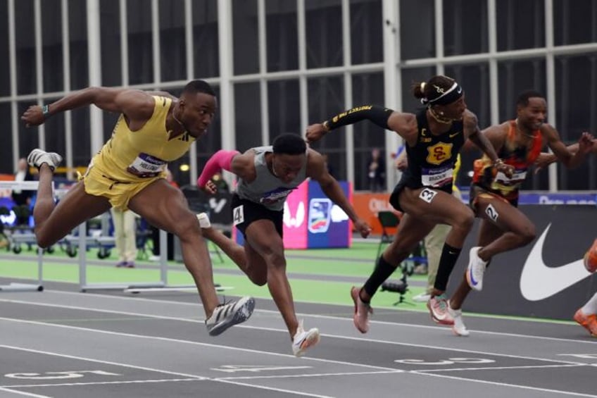 Grant Holloway (far left) blazes to victory in the men's 60m hurdles at the US Indoor Cham