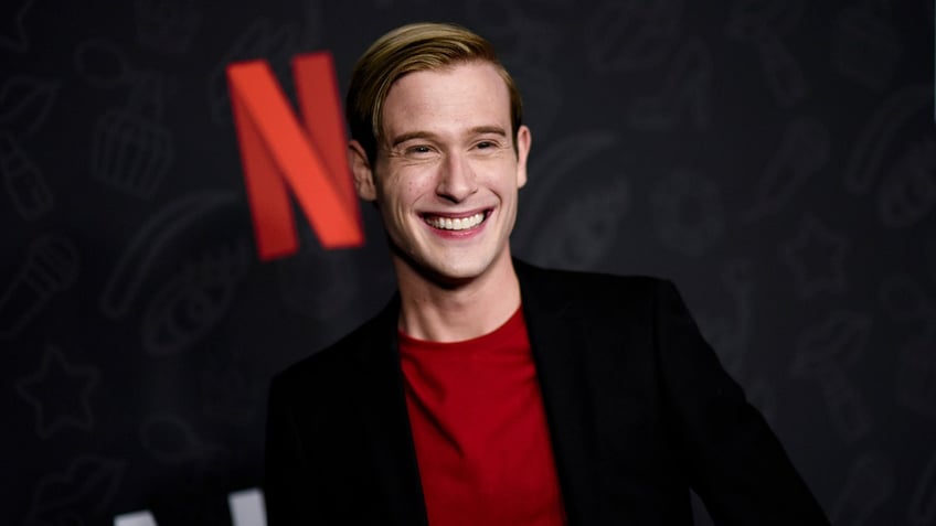 Tyler Henry posing on the red carpet