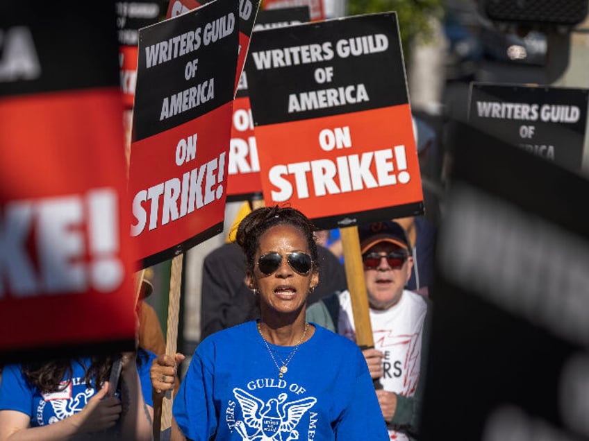 hollywood writers strike is over wga votes to lift strike order after 148 days