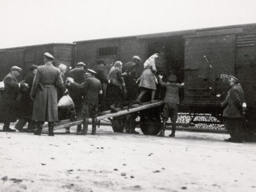 POLAND - JANUARY 01: Holocaust: Deportation of Polish Jews in cattle carriages on "re