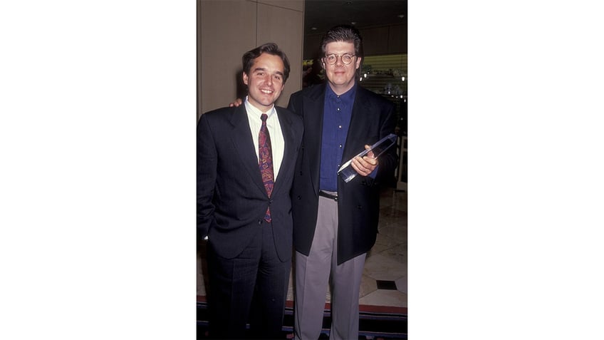 Chris Columbus and John Hughes attend an event