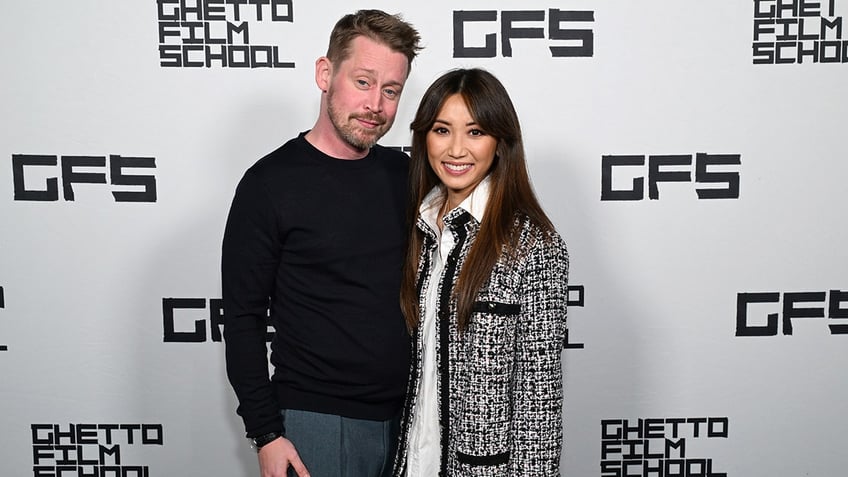 Macaulay Culkin and Brenda song on a red carpet