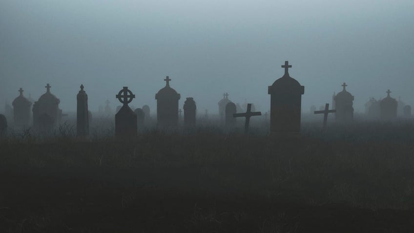 home in the middle of a cemetery is up for sale ahead of the spooky halloween holiday see the photos