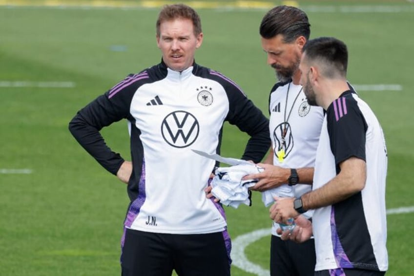 Germany coach Julian Nagelsmann (L) at a training session ahead of Wednesday's match again