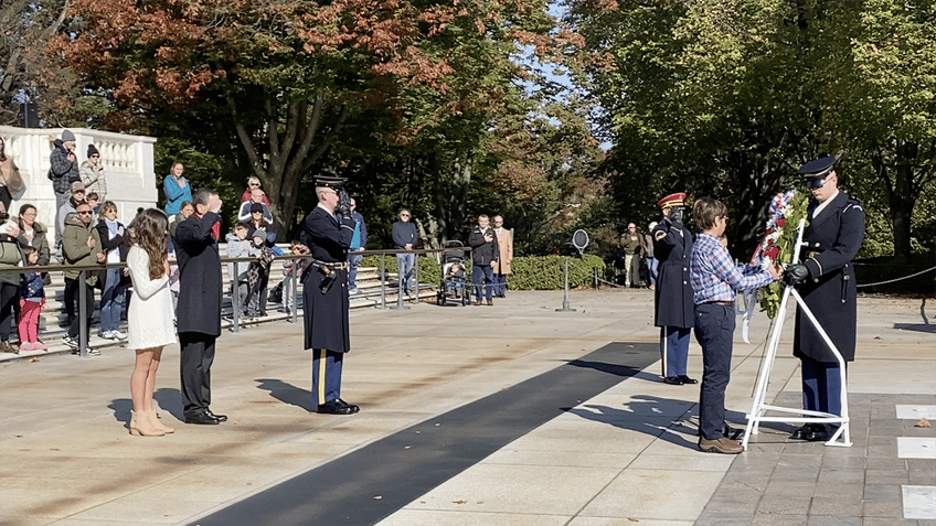 homeschooled children honor medal of honor recipient fr emil kapaun at arlington national cemetery