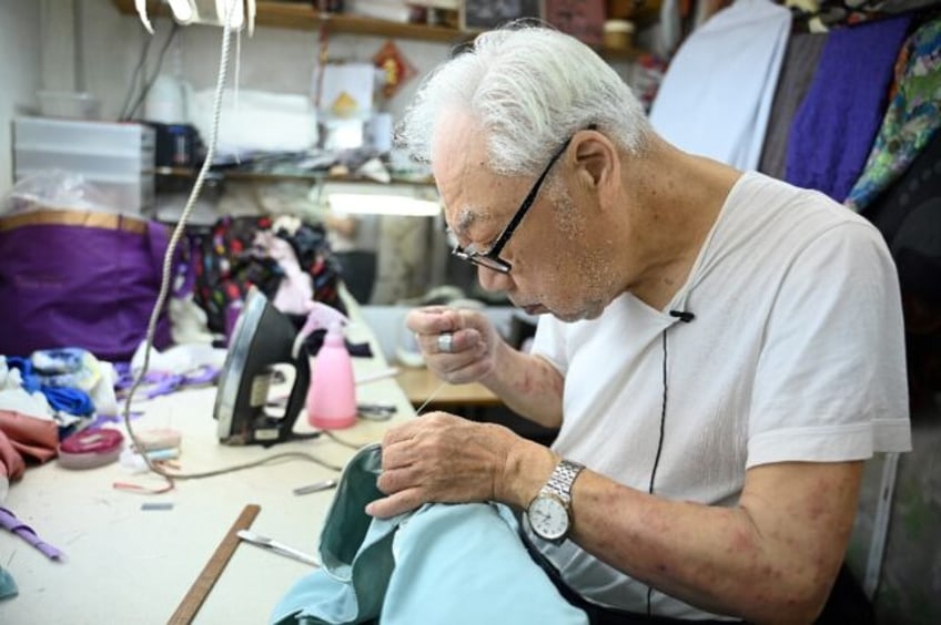 At 88, Yan Kar-man is one of Hong Kong's oldest master tailors of the cheongsam, an elegan