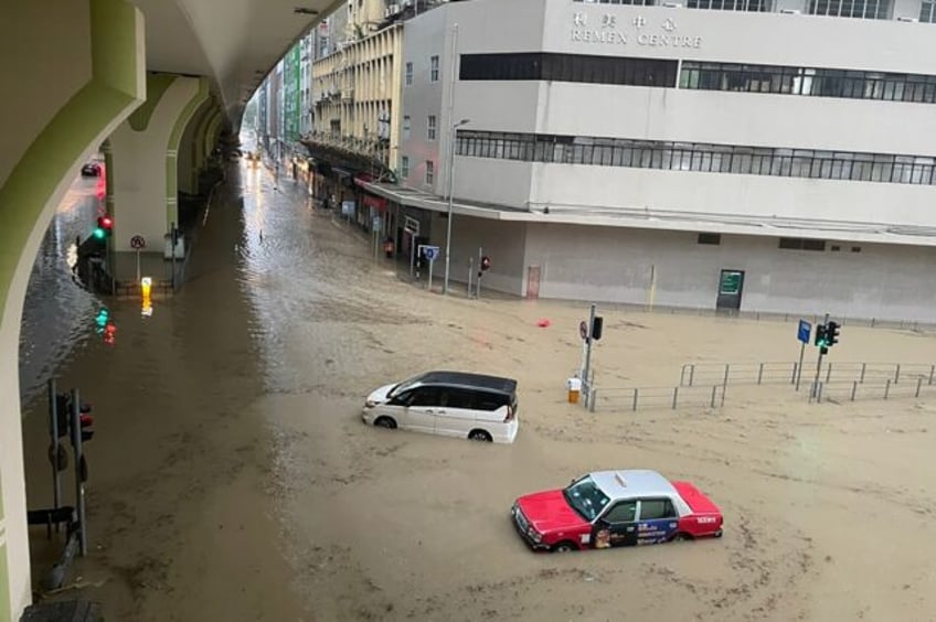 hong kong flooded by heaviest rainfall in 140 years