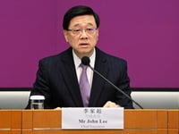 Hong Kong leader defends foreign trade offices after UK spying arrests