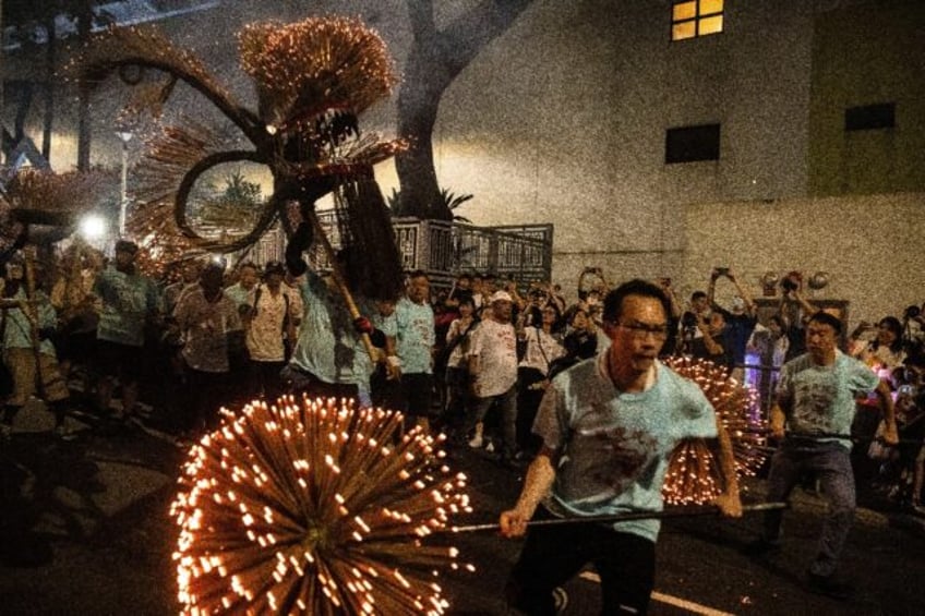 hong kong revives living tradition of fire dragon dance