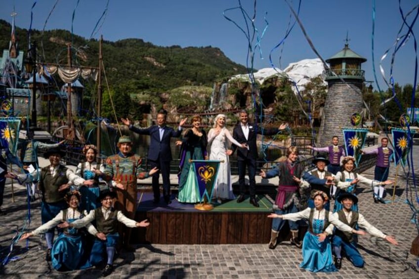 hong kongs disneyland opens 1st frozen themed attraction part of a 60b global expansion