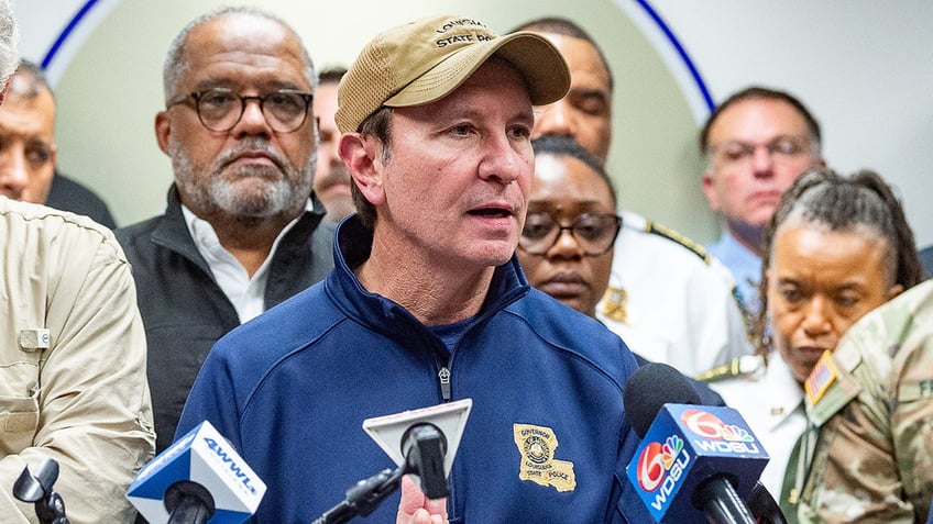 Jeff Landry talks to reporters