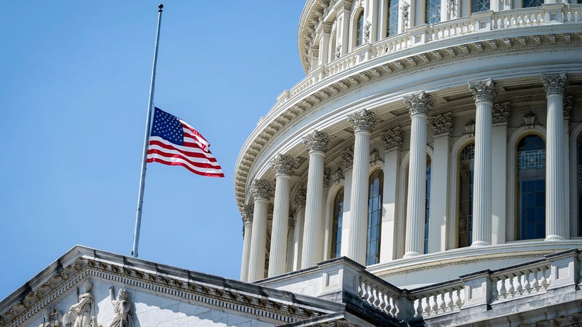 The US flag at half mast