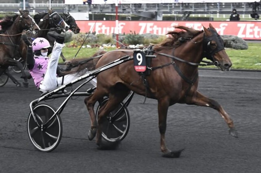 Jean-Michel Bazire winning last year's Prix d'Amerique with Hooker Berry