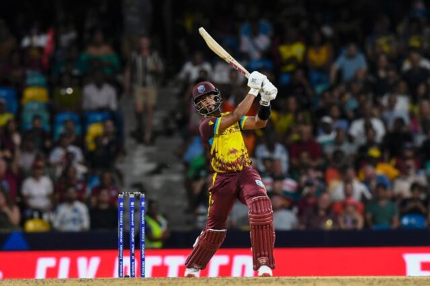 Shai Hope smashes a six en route to 82 from 39 balls in West Indies' nine-wicket drubbing