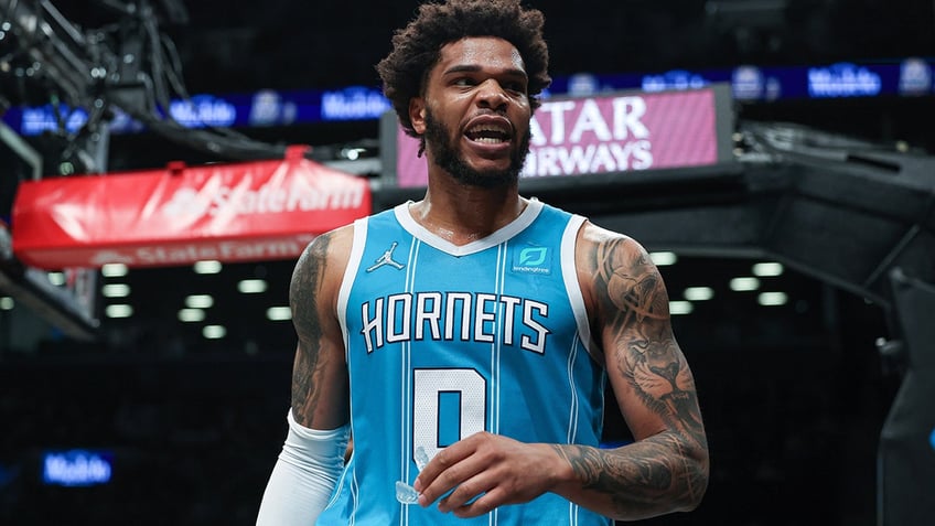 hornets star has arrest warrant issued for alleged protective order violation from domestic charge report