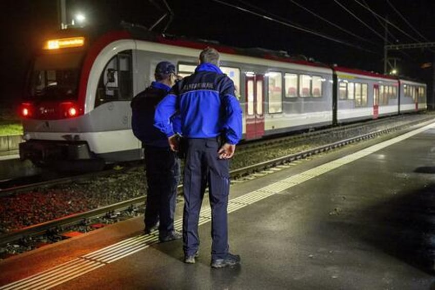 hostage taking iranian migrant shot dead by swiss police in train incident