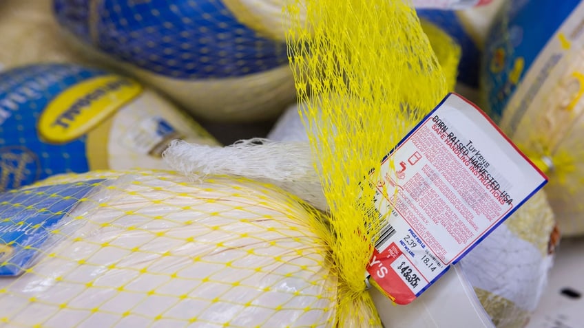 A turkey priced at $43.35 sits on a pile of other turkeys on Wednesday, Nov. 8, 2023, at Gray's Foods, 1630 N. Alpine Road, in Rockford, Illinois.