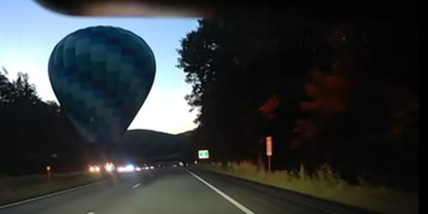 hot air balloon lands on vermont highway median after mid flight stall uncommon and unplanned location