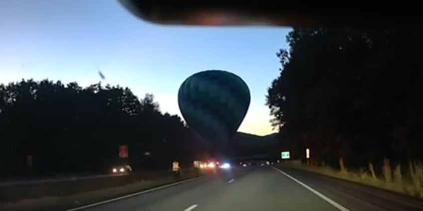 hot air balloon lands on vermont highway median after mid flight stall uncommon and unplanned location