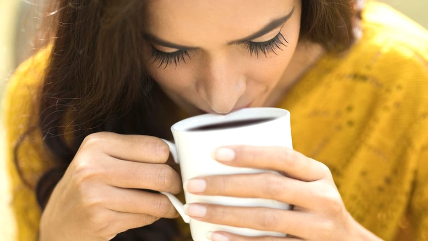 Woman drinking coffee