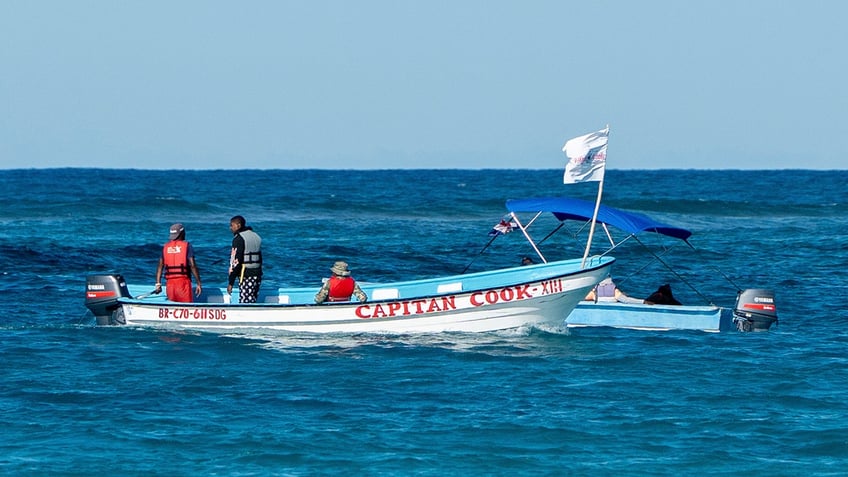 Civil defense boats search for Sudiksha Konanki on Monday, March. 10.