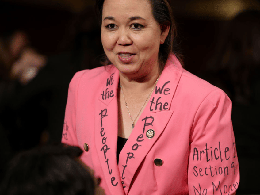 WASHINGTON, DC - MARCH 04: Rep. Jill Tokuda (D-HI) wears a jacket with writing of the U.S.