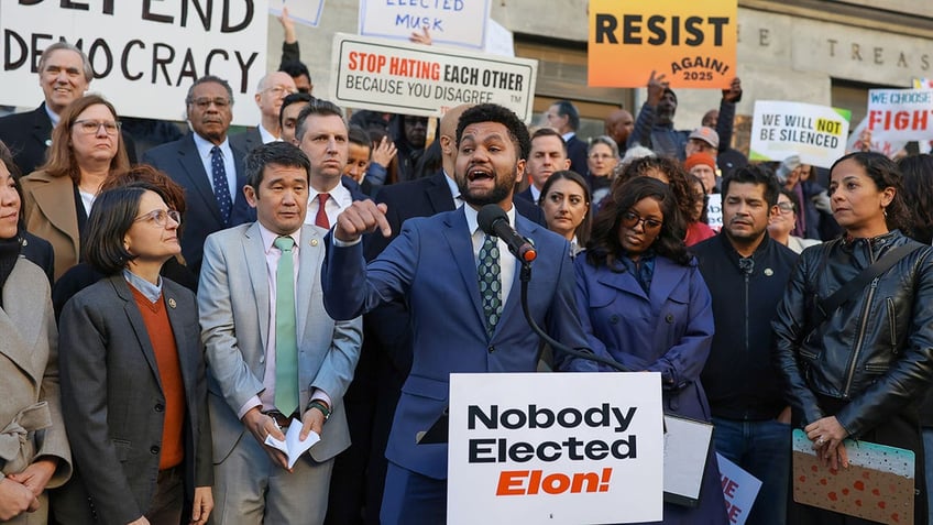 Rep Frost holds an anti-Musk protest