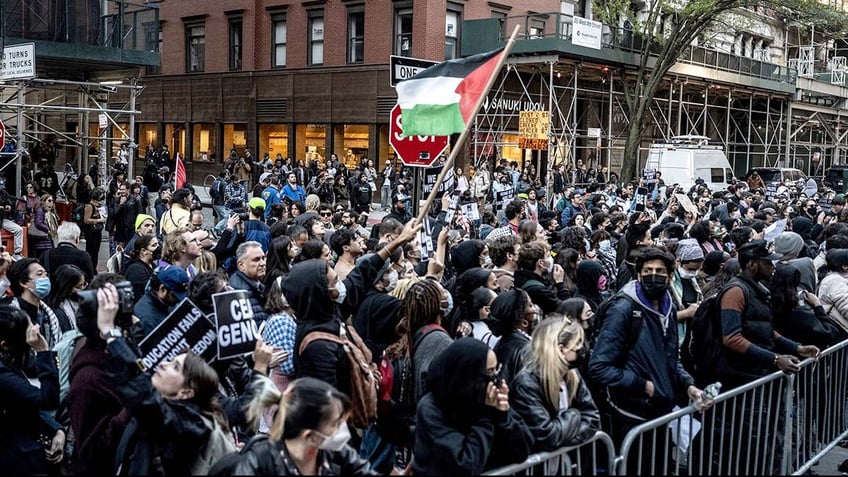 Pro-Palestinian demonstrators outside the Stern School of Business at New York University in the Greenwich Village neighborhood of New York, US, on Monday, April 22, 2024. 