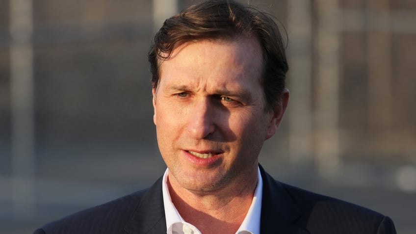 Rep. Dan Goldman, D-N.Y., speaks during a press conference at the entrance of the migrant relief center at Brooklyn Cruise Terminal on Feb. 2, 2023 in New York City.