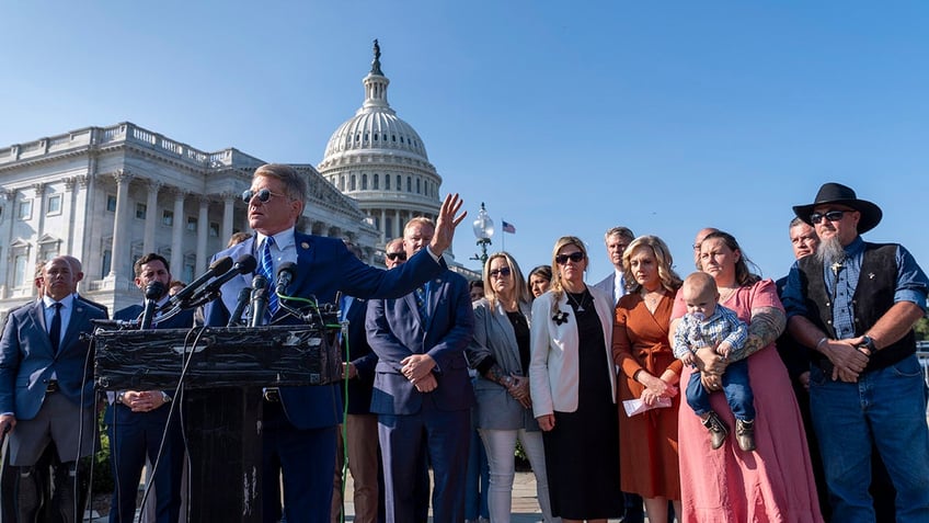 McCaul with the Abbey Gate families in front of the Capitol 