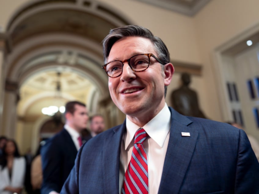 Speaker of the House Mike Johnson, R-La., talks to reporters just after lawmakers pushed a $95 billion national security aid package for Ukraine, Israel and other U.S. allies closer to passage, at the Capitol in Washington, Friday, April 19, 2024. (AP Photo/J. Scott Applewhite)