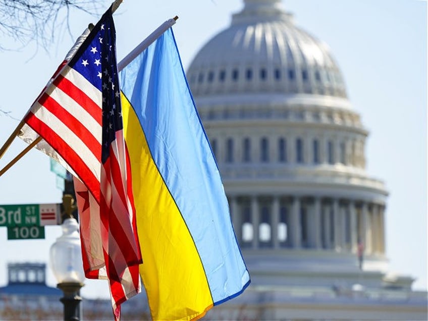 The flags of Ukraine, the United States, and the District of Columbia fly together on Penn