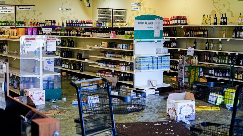 Broken wine bottle inside the store