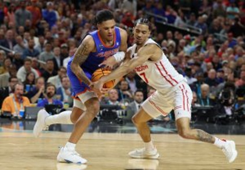Houston's Milos Uzan withdraws from 2025 NBA Draft