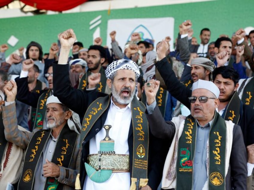 SANA'A, YEMEN - NOVEMBER 22: Yemen's Houthi movement followers chant slogans as they atten