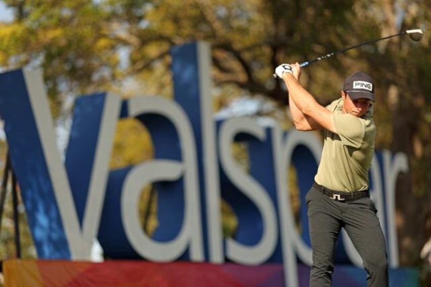 Norway's Viktor Hovland plays a tee shot on the way to a share of the third-round lead in