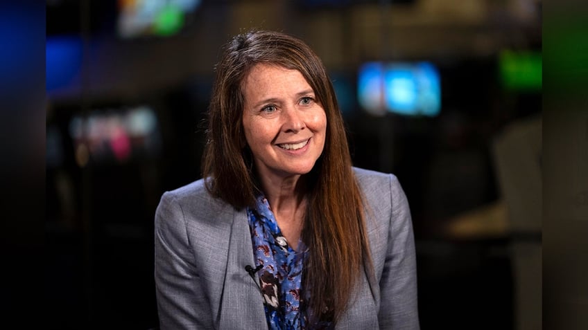 jen easterly smiles during interview