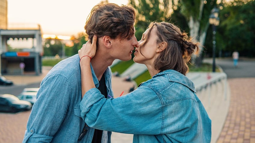 young couple kissing