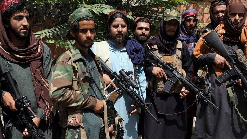 Taliban fighters pose for photograph in Wazir Akbar Khan in the city of Kabul, Afghanistan, Wednesday, Aug. 18, 2021. The Taliban declared an "amnesty" across Afghanistan and urged women to join their government Tuesday, seeking to convince a wary population that they have changed a day after deadly chaos gripped the main airport as desperate crowds tried to flee the country. (AP Photo/Rahmat Gul)