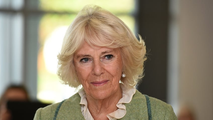 A close-up of Camilla looking serious