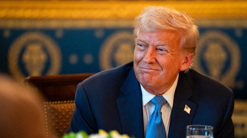 Donald Trump smiles