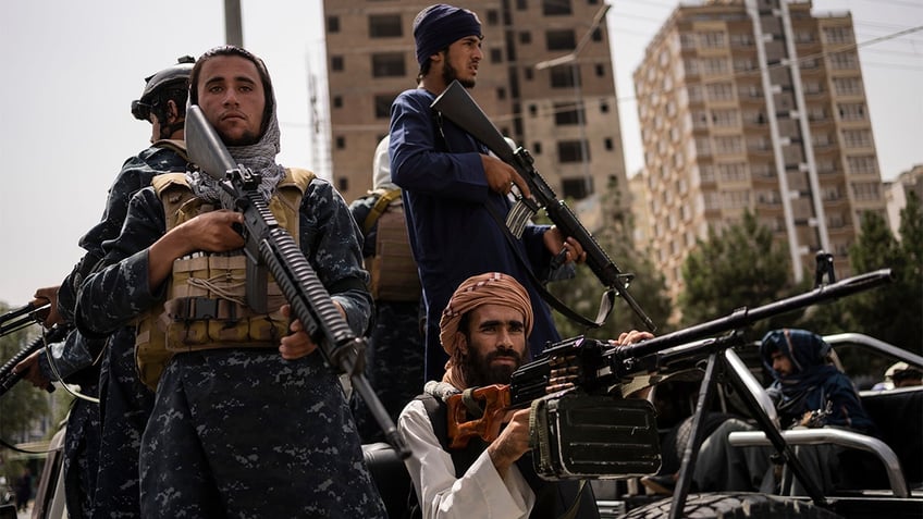 Taliban Marchers Support Women