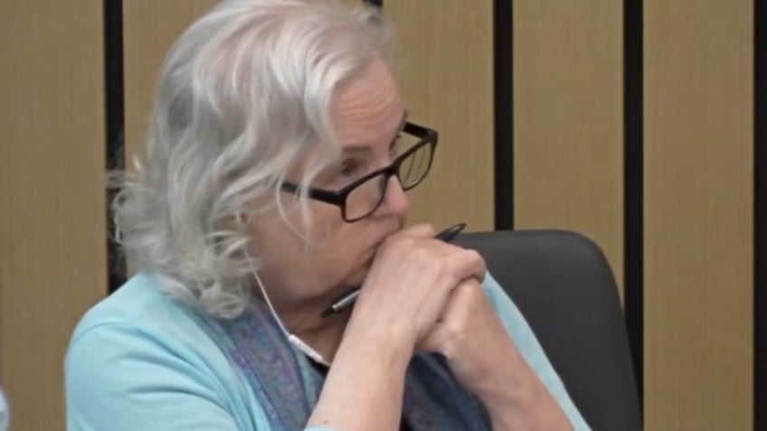 Nancy Crampton Brophy listens in court.