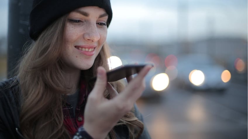 woman using an iPhone