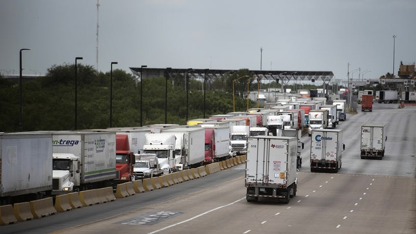 trucks on highway near border crossing