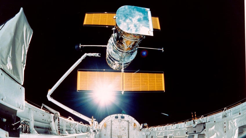 hubble space telescope sees planet around red dwarf star getting hiccups