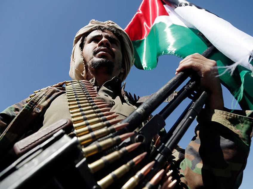 SANA'A, YEMEN - DECEMBER 02: Yemenis recently militarily trained by the Houthi movement hold their guns as they take part in an armed popular parade held in Al-Sabeen Square to get ready to go and fight Israel in the Gaza Strip, on December 02, 2023 in Sana'a, Yemen. Thousands of …