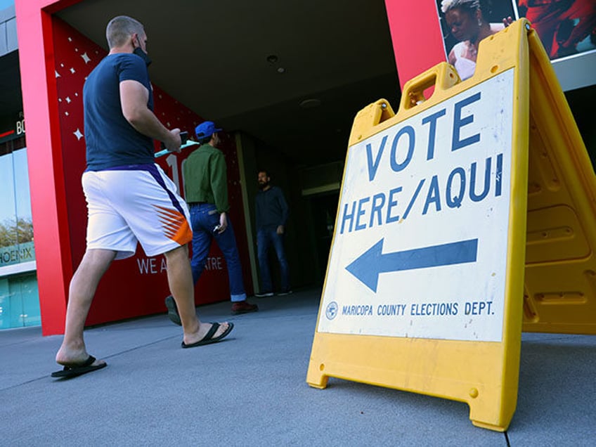 Voters arrive to cast their ballots at the Phoenix Art Museum on November 08, 2022 in Phoe